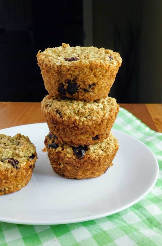 gluten free dairy free cranberry orange muffins stacked