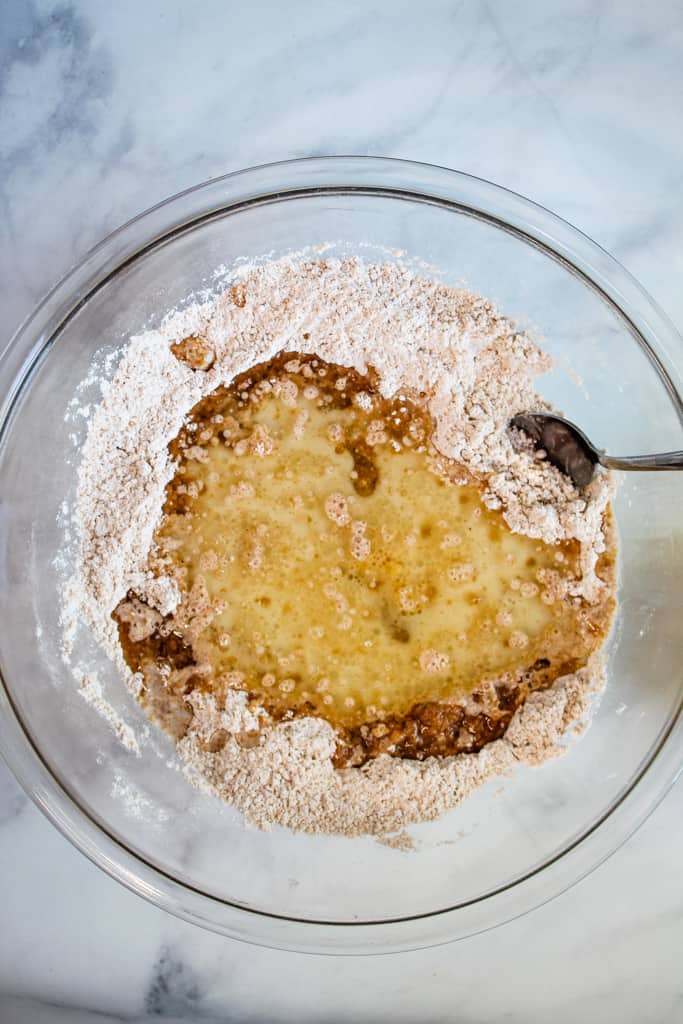 gluten free apple muffins wet ingredients in a glass bowl