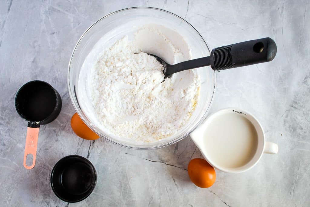 Ingredients for gluten free pita bread on a white counter