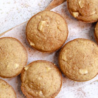 apple quinoa muffins baked sitting on a serving plate