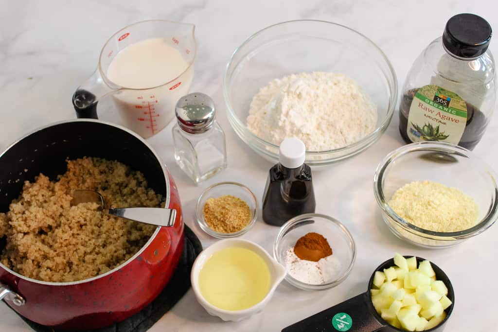 apple quinoa muffins ingredients on a white counter