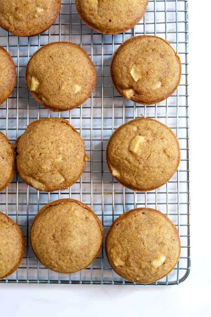 apple quinoa muffins on a wire baking rack