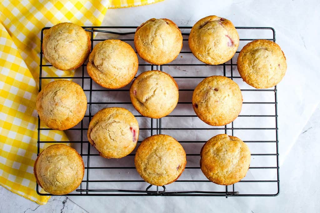 Gluten free strawberry muffins on a wire rack