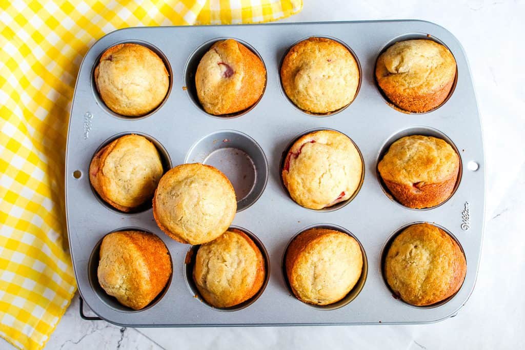 Gluten free strawberry muffins in a muffin pan