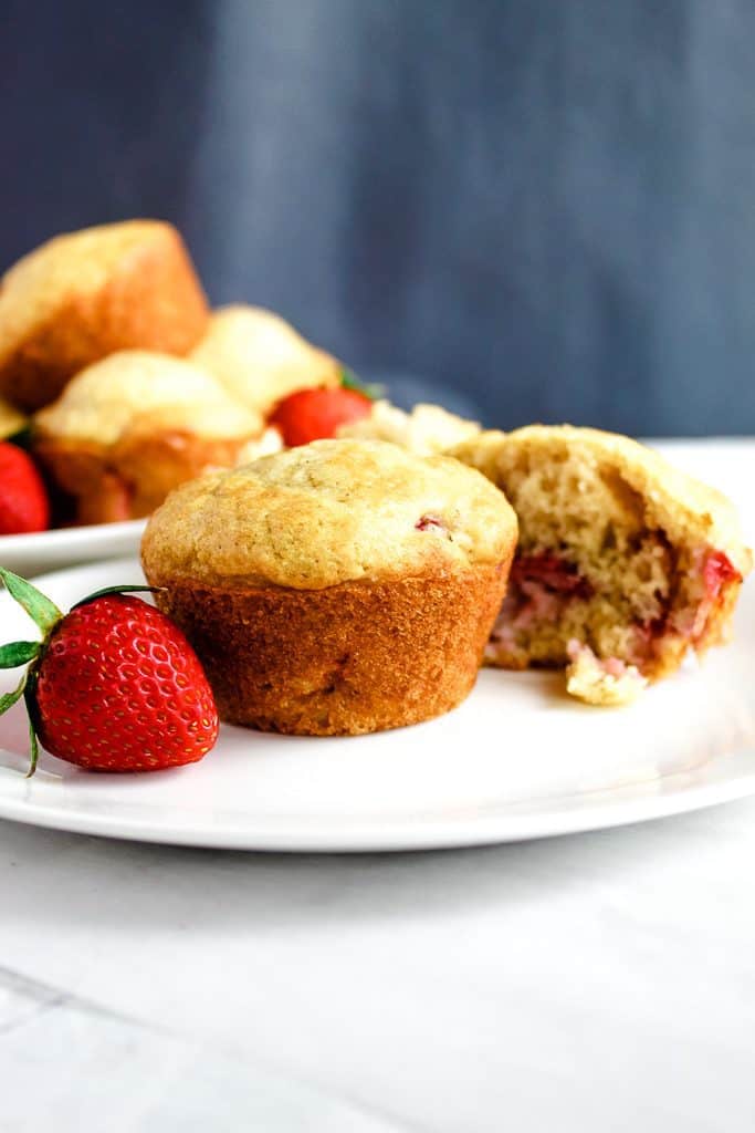 Gluten free strawberry muffins on a white plate
