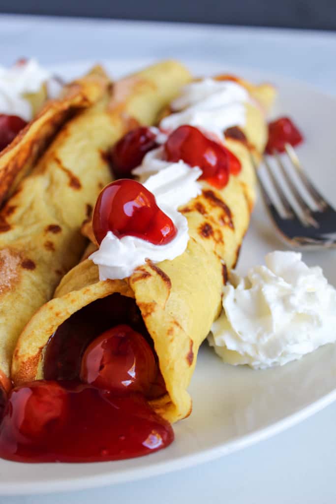 gluten free crepes served on a white plate