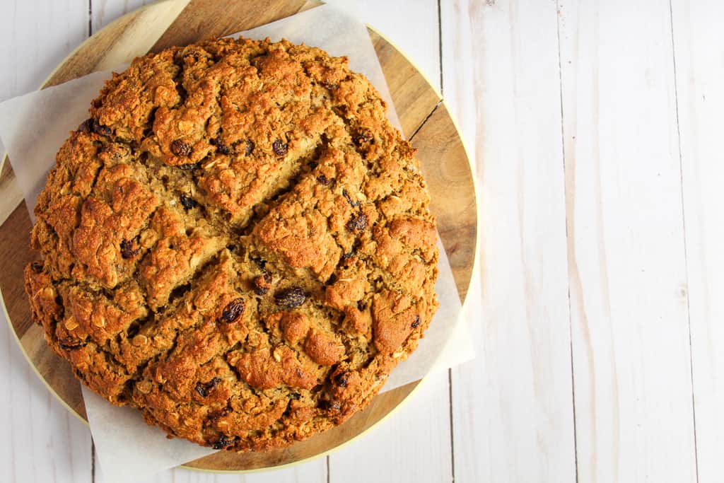 loaf of gluten free Irish soda bread on a white counter