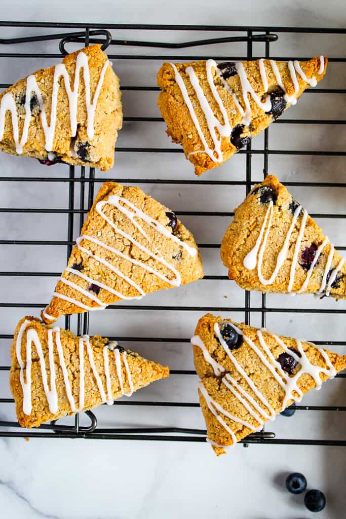 gluten free lemon blueberry scones on a wire rack