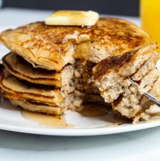 rice flour pancakes stacked on a white plate