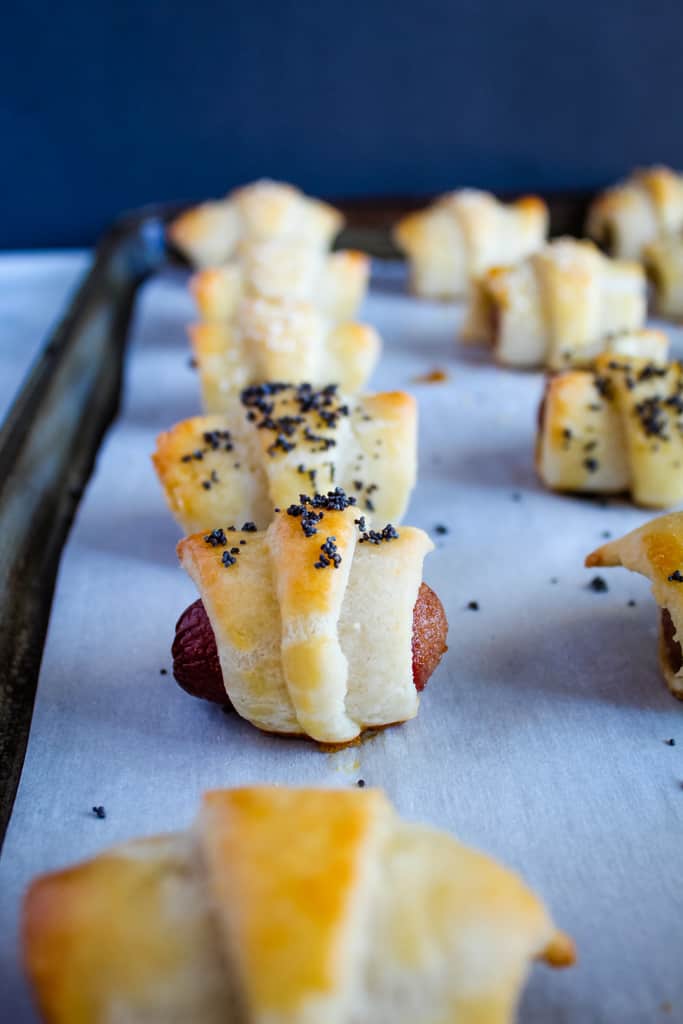 gluten free pigs in a blanket baked sitting on a pan