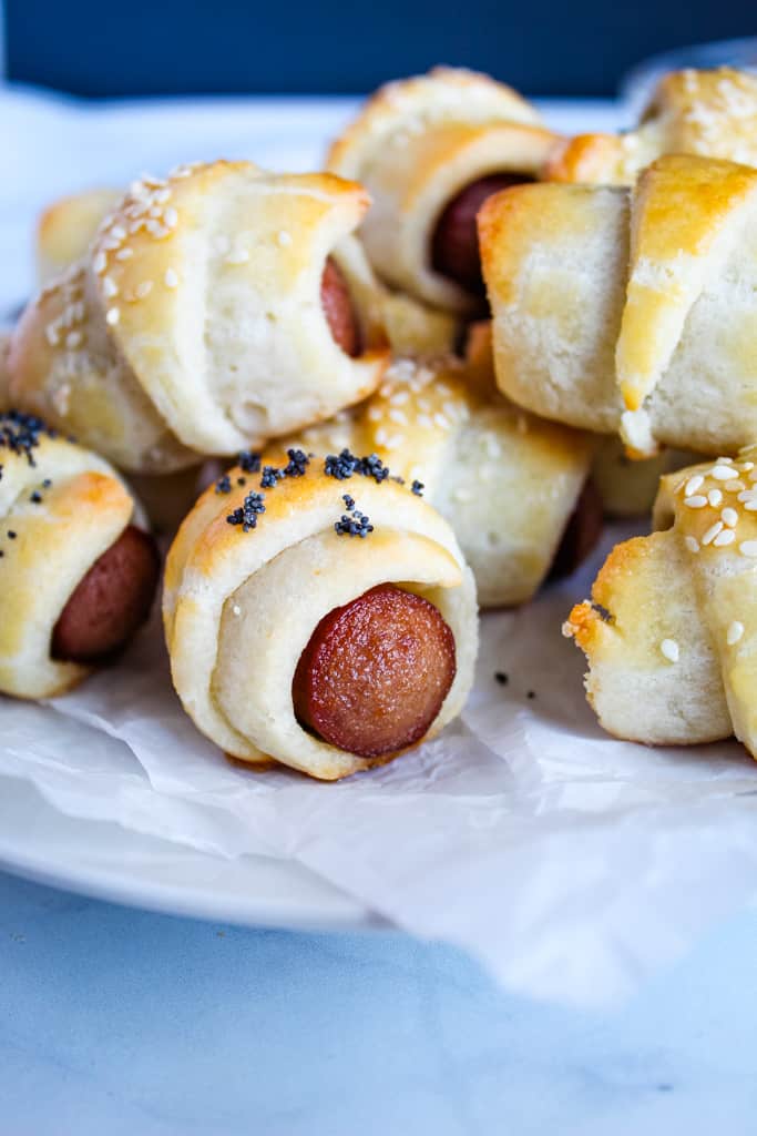 gluten free pigs in a blanket served on a white plate