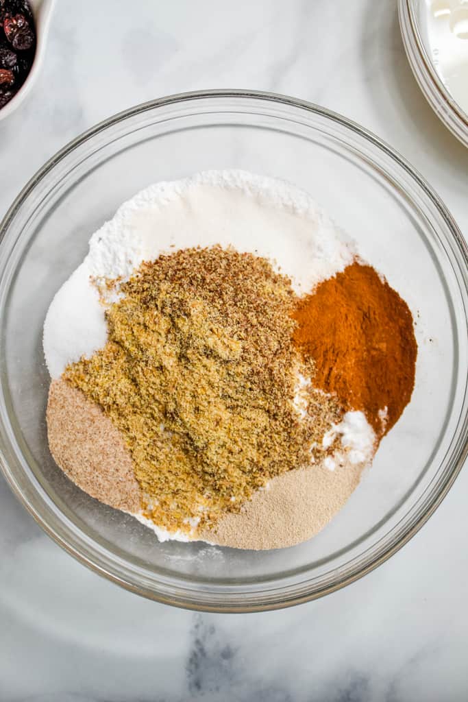 Dry ingredients of gluten free bread machine cinnamon raisin bread.