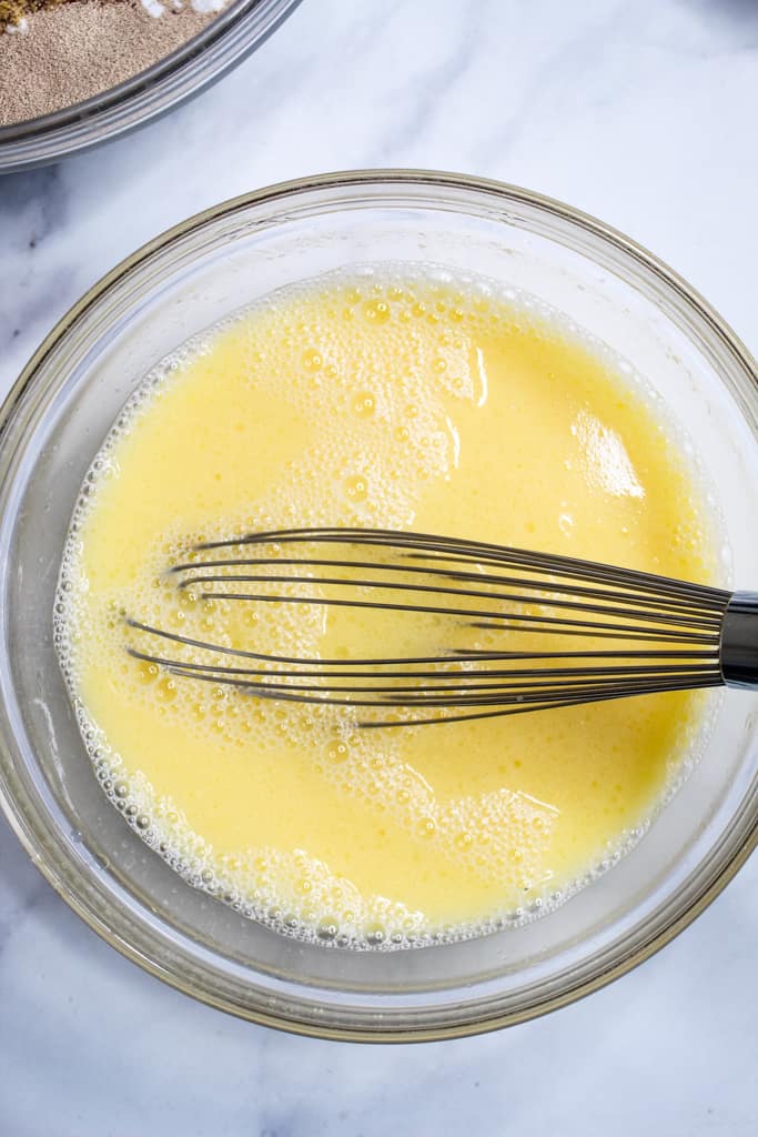 gluten free bread machine cinnamon raisin bread in a glass bowl