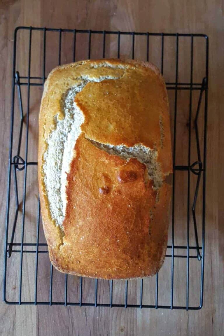 loaf of bread on a wire cooling rack ultimate gluten free bread making class