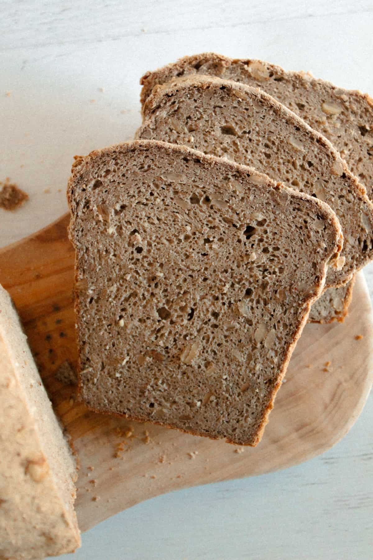 slices of buckwheat bread on a cutting board.