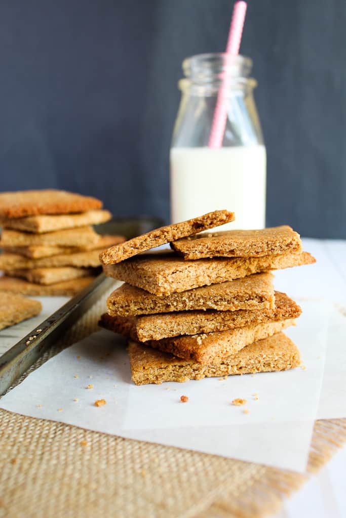 lowcarb gluten free graham crackers stacked on a white parchment.