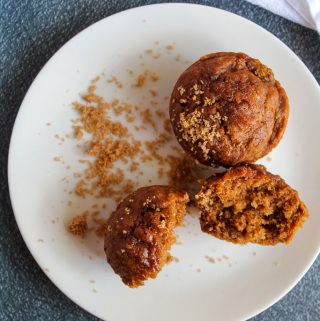 vegan pumpkin muffins on a white plate.