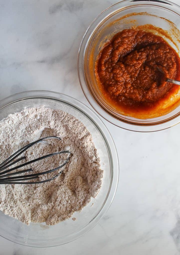 vegan pumpkin muffins dry mix in a glass bowl.