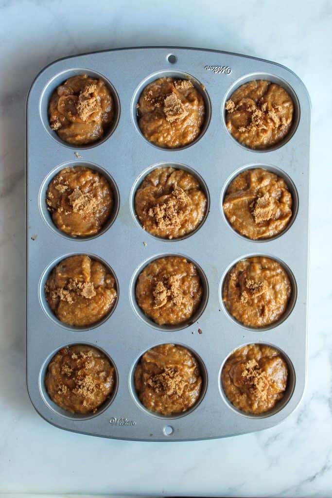 vegan pumpkin muffins batter in the pan.