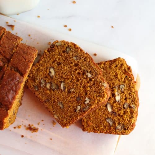 gluten free pumpkin bread thick slices on a counter.