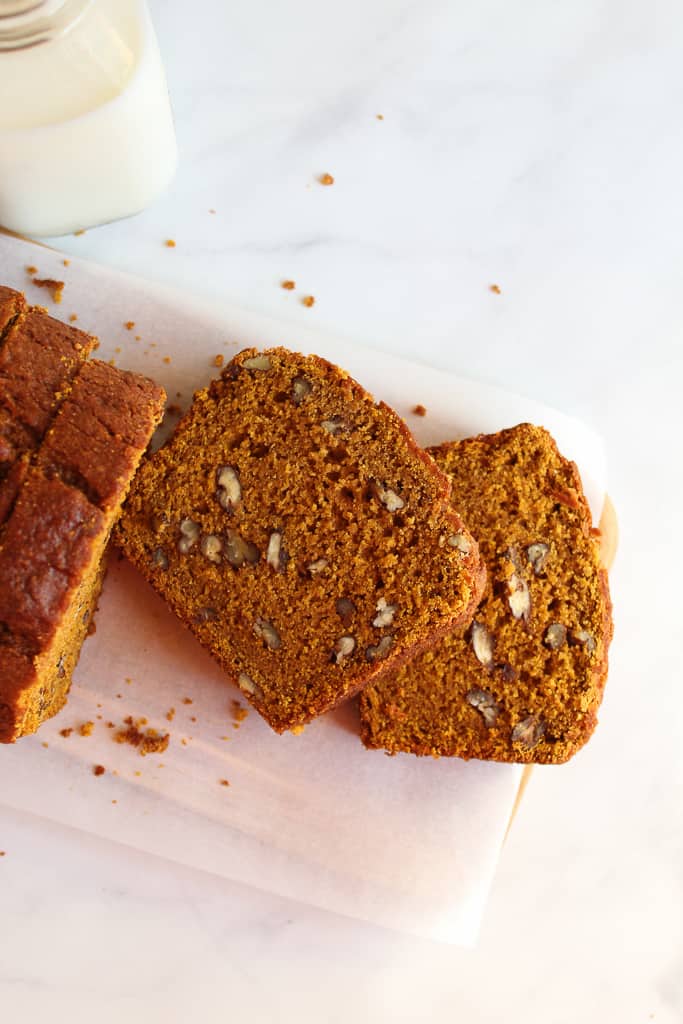 gluten free pumpkin bread thick slices on a counter.