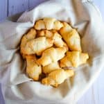 Gluten free crescent rolls in a serving basket