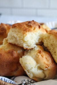up close shot of dinner rolls in a basket