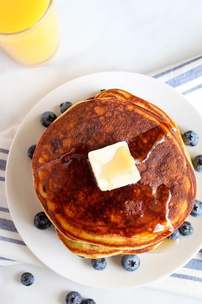 gluten free blueberry pancakes served on a white plate