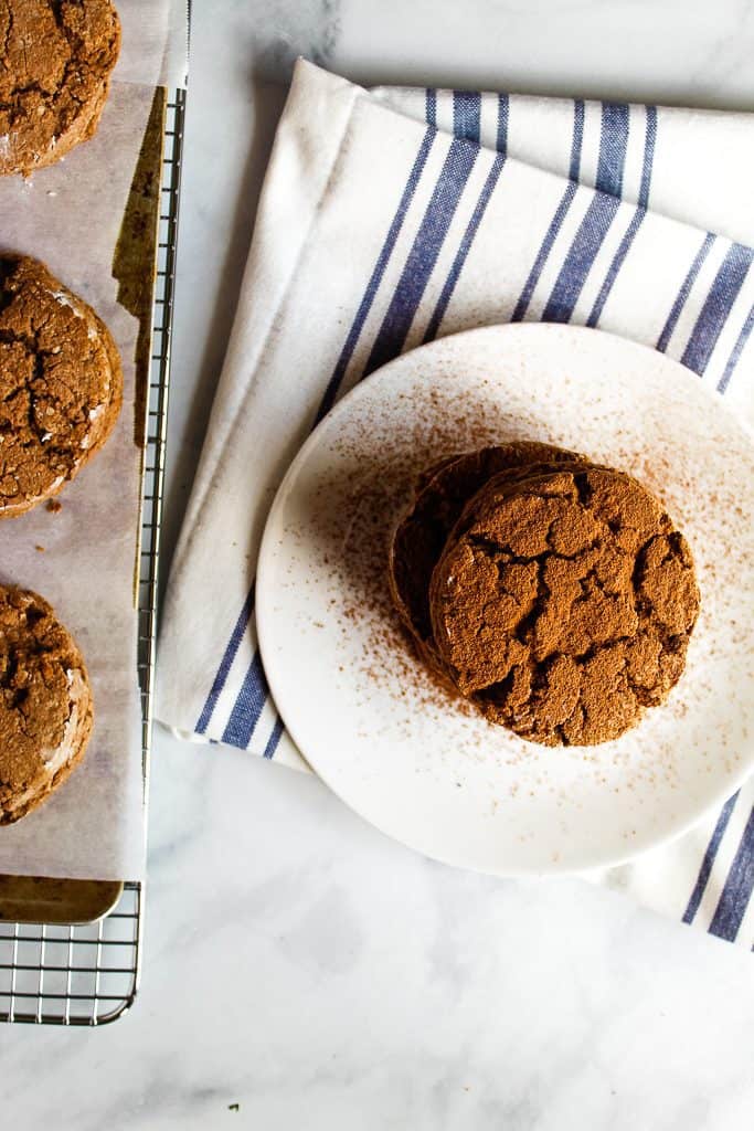 gluten free chocolate biscuits on a white plate.