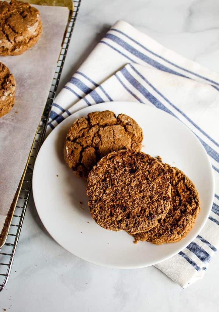 gluten free chocolate biscuits on a white plate.