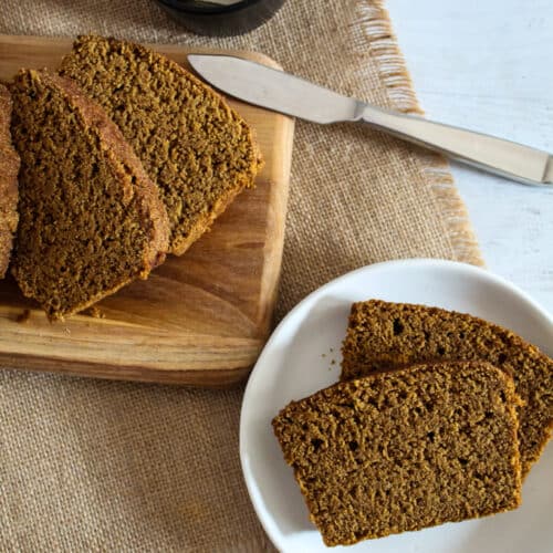 overhead shot of brown bread sliced on a plate