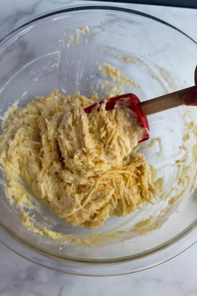 batter of gluten free garlic bread in a glass bowl