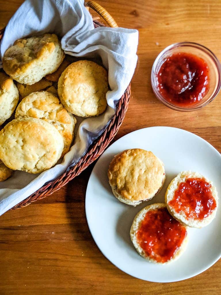 angel biscuits with jelly on a white plate