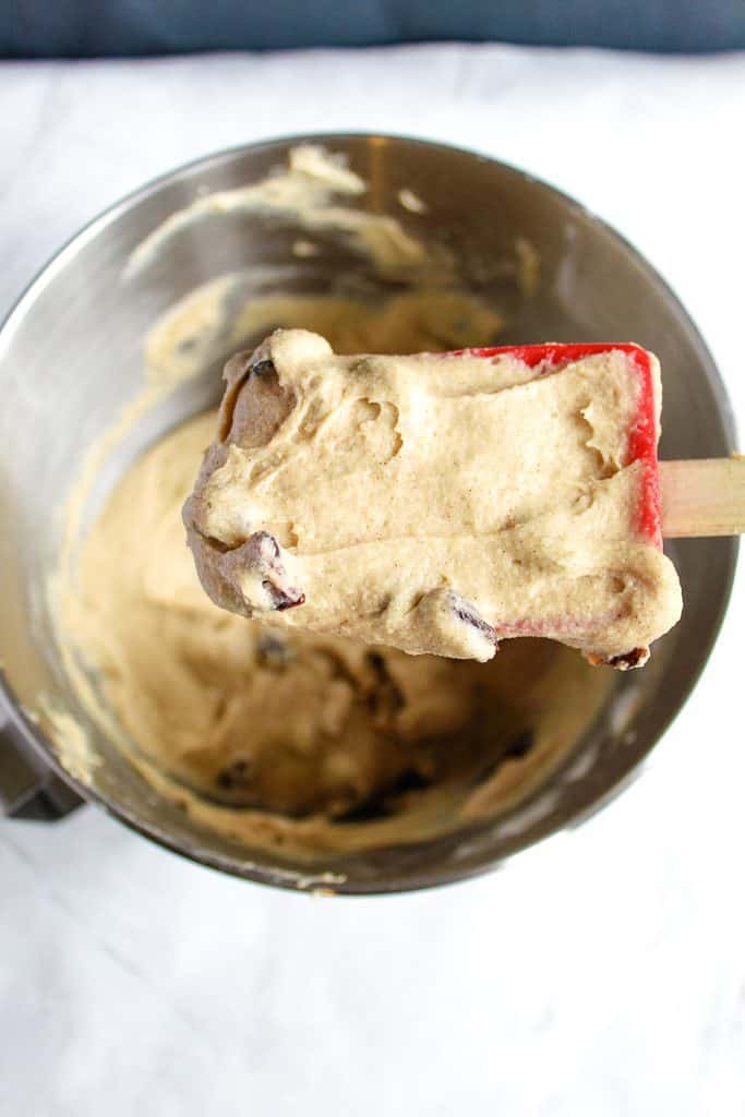 gluten free hot cross bun batter on a spoon, close up