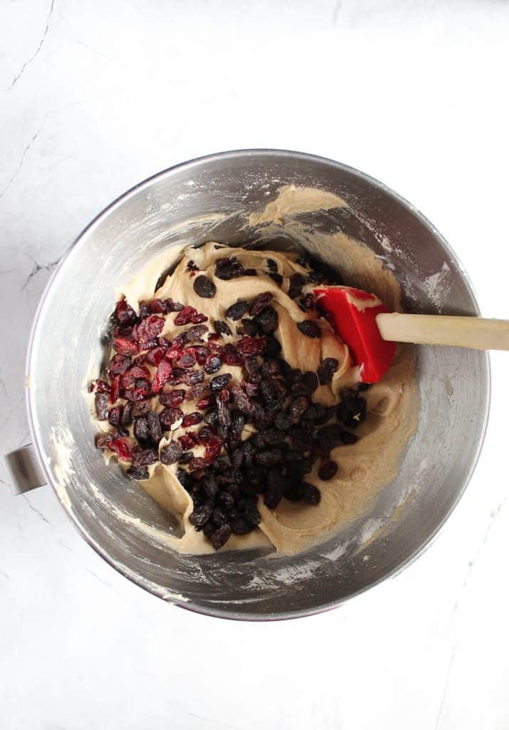 gluten free hot cross buns batter with cranberries in a steel bowl