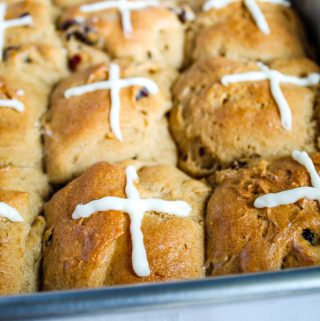 gluten free hot cross buns in a metal pan