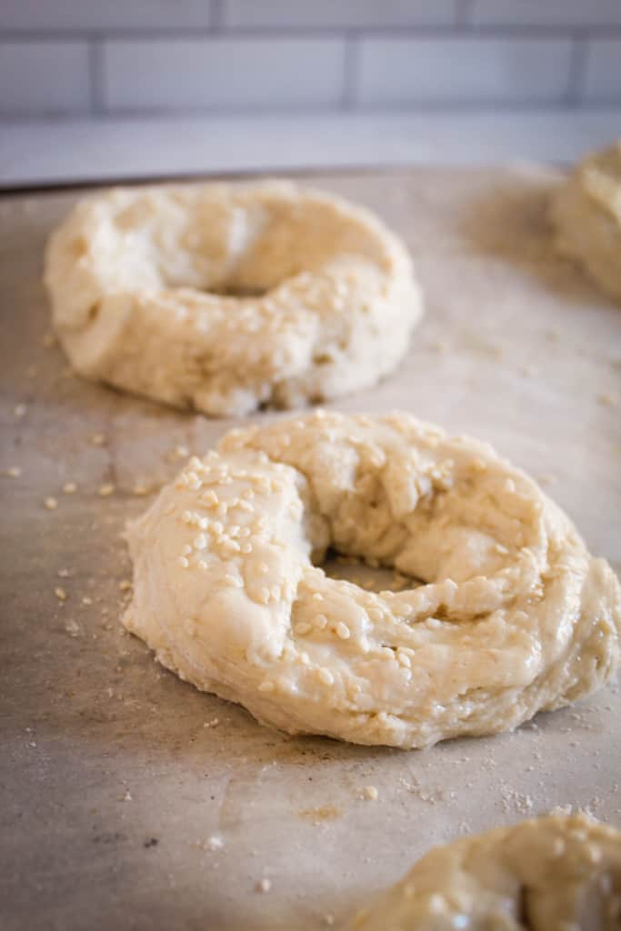 forming the bagels on a baking sheet