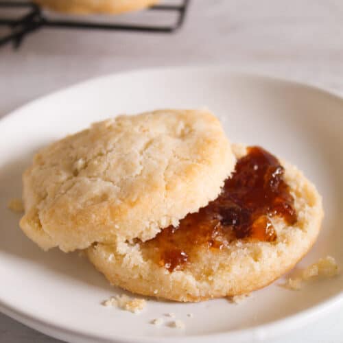 split biscuits on a small white plate