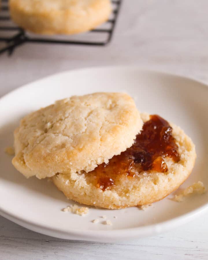split biscuits on a small white plate