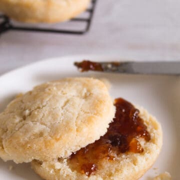 split biscuits on a small white plate