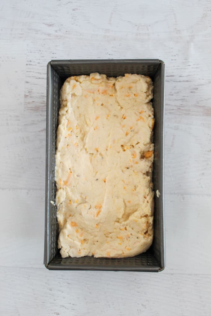unbaked bread in a baking pan