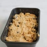 gluten free blueberry bread batter in the pan ready to bake