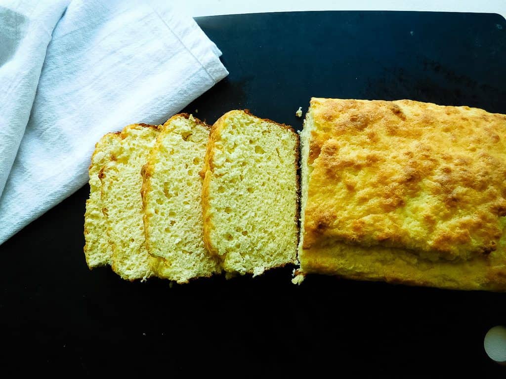 slices of low carb bread on a serving board.