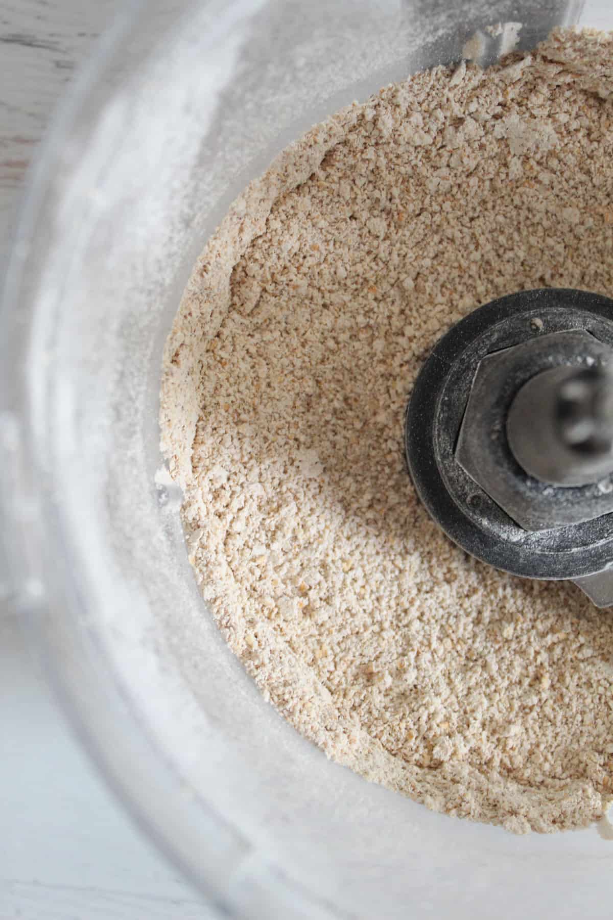 mixing oats in a food processor