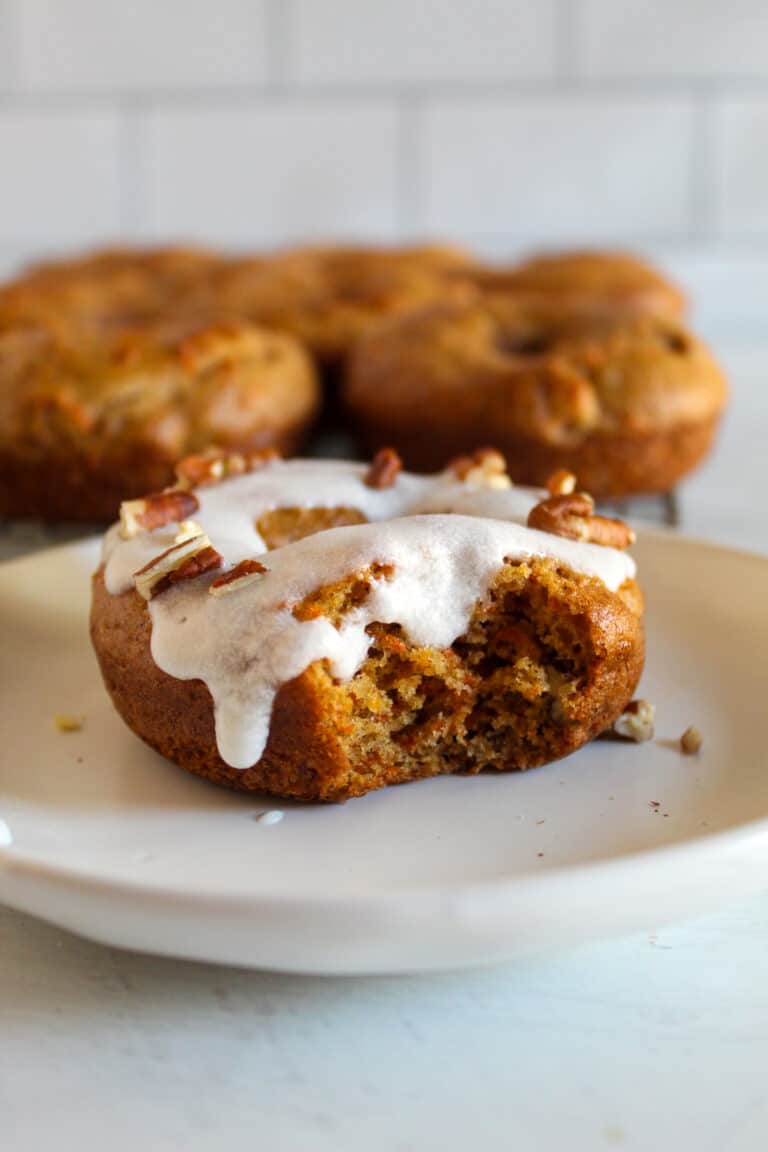 bite of a gluten free carrot cake donut