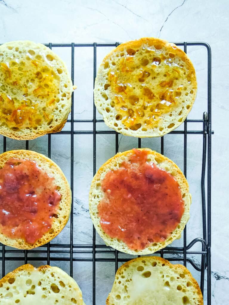 gluten free english muffins on a wire rack
