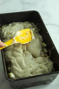 spreading batter in baking pan