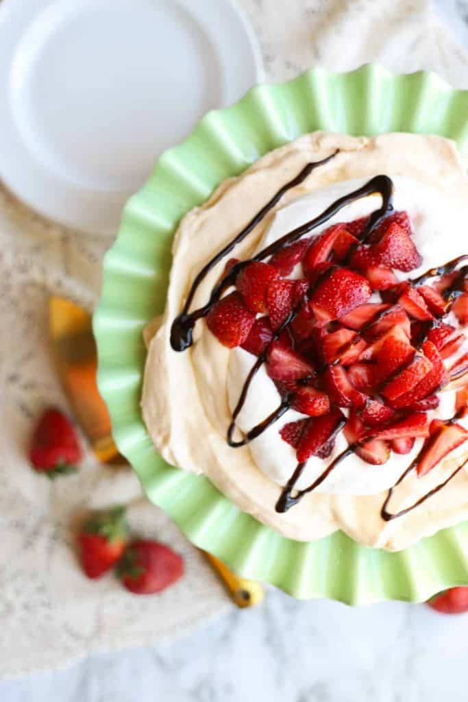strawberry pavlova on a serving plate