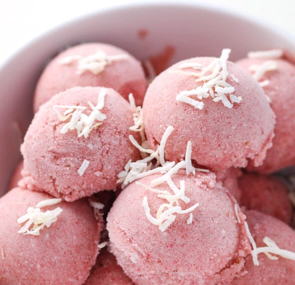 coconut strawberry banana ice cream in a white bowl