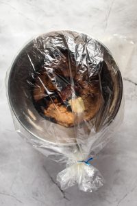 gluten free pumpernickel bread batter in a bowl in a bag